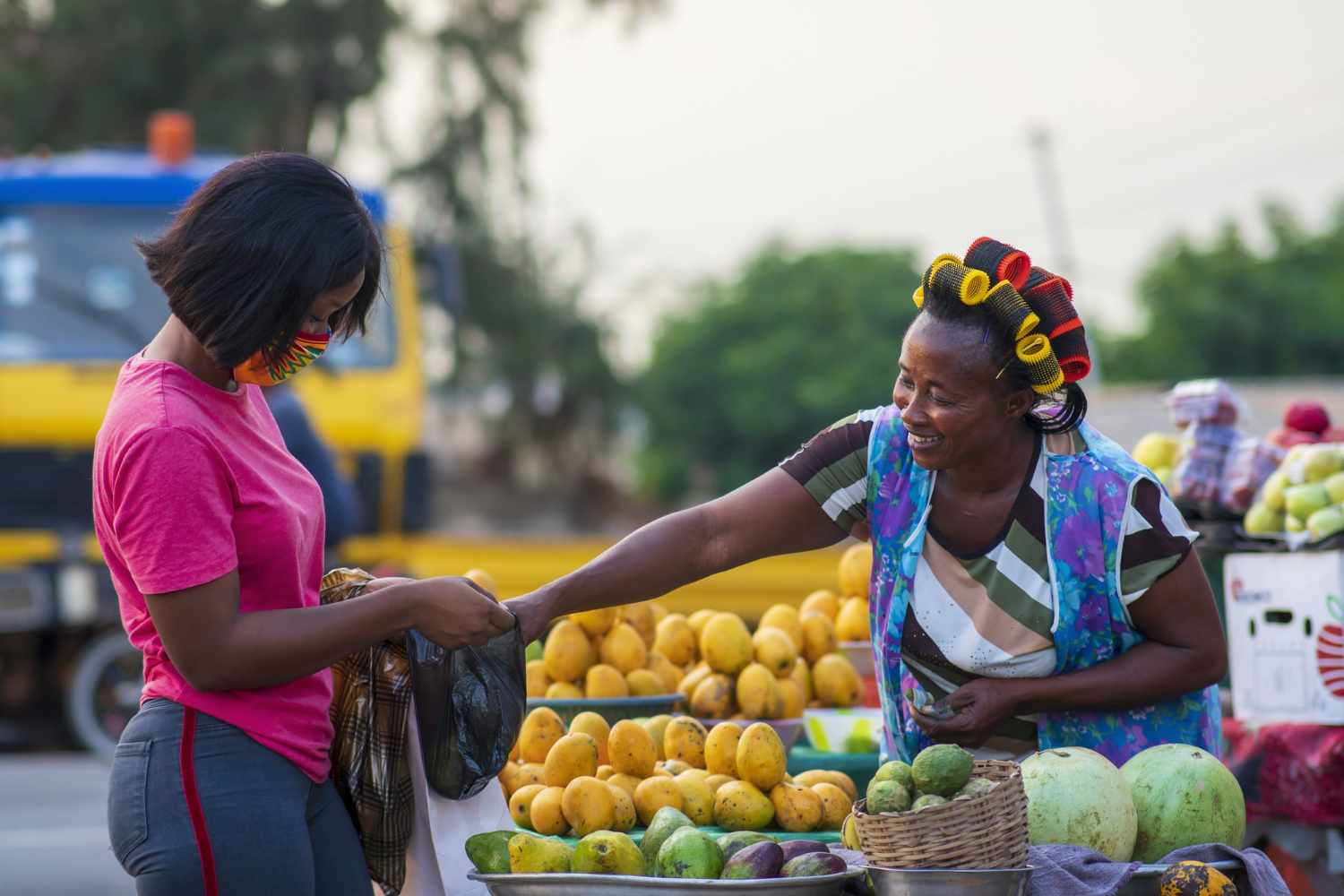women-shopping-fruit-market